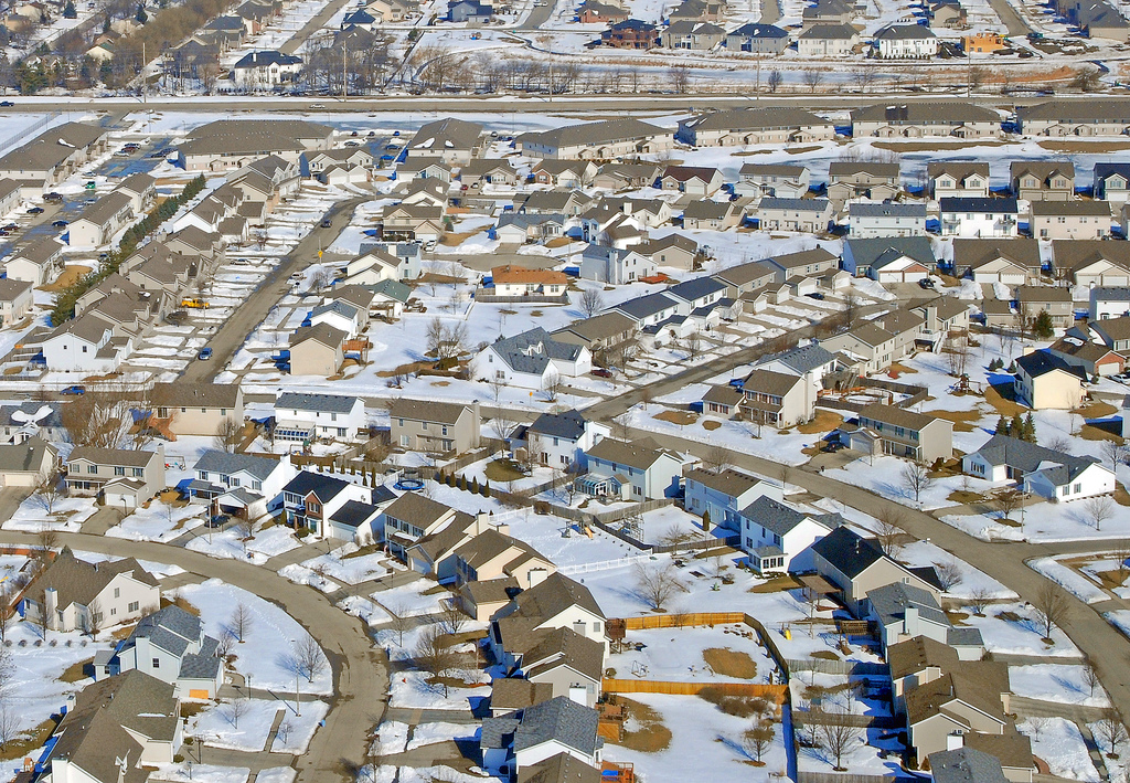 It will be very hard to change transportation patterns in communities like this one in Bloomington, IL. Credit: Tim, Flickr