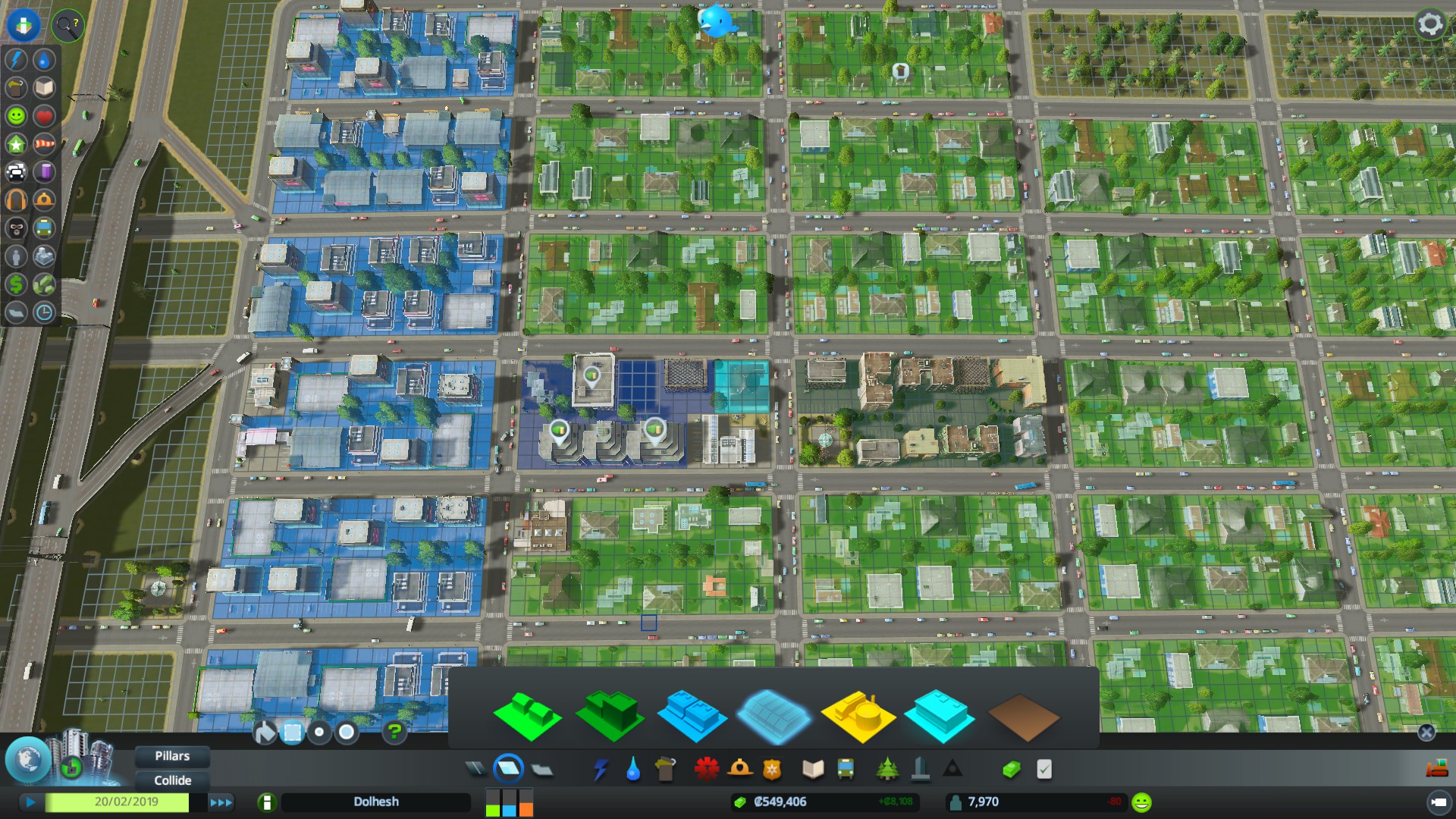 Zoning in Cities: Skylines: low-density commercial (light blue), high-density commercial (dark blue), and low-density residential (green).